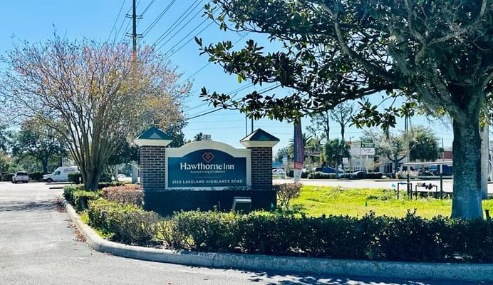 Exterior view of Hawthorne Inn sign and entrance