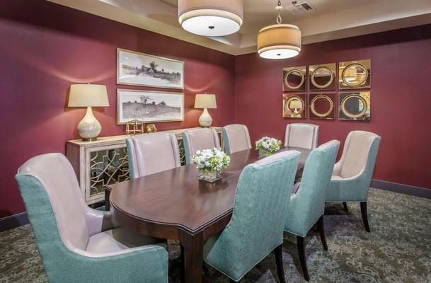 Elegant common area with a dining table and decor