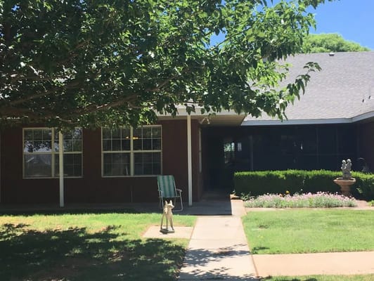 Exterior view of Heartland House with gardens