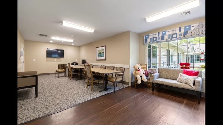 Cozy common area with seating and game tables