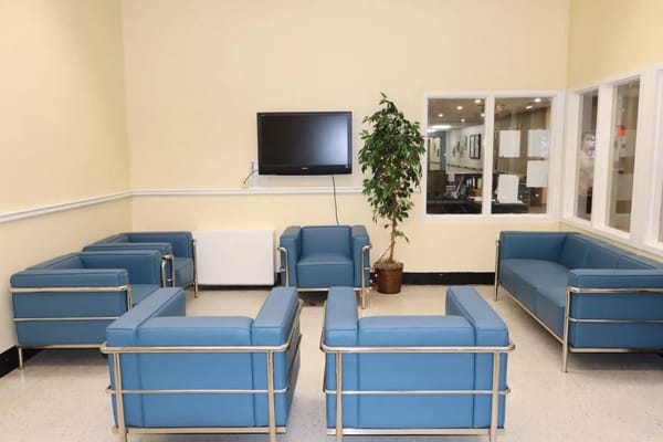 Interior common area with blue seating.