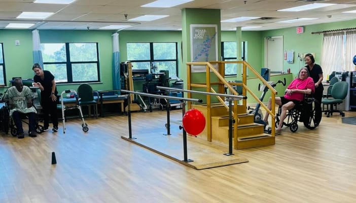 Residents participating in a group activity in the common area