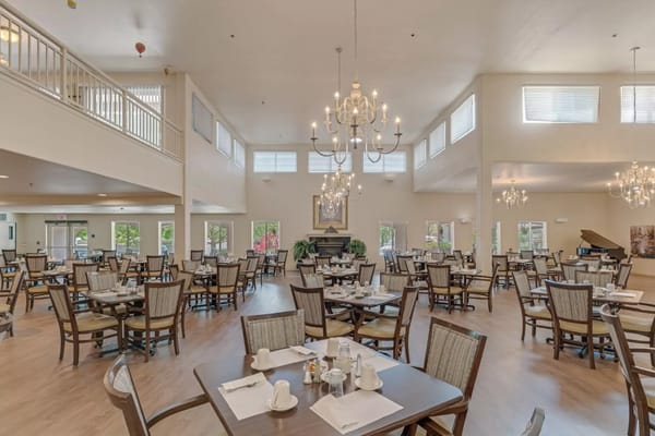 Bright dining area with tables set for meals
