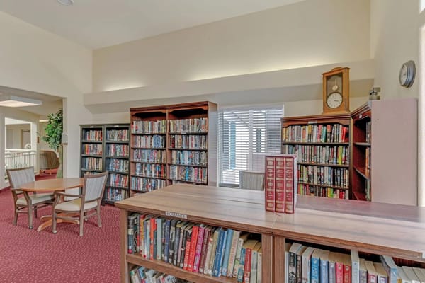 Interior view of a library with bookshelves and seating