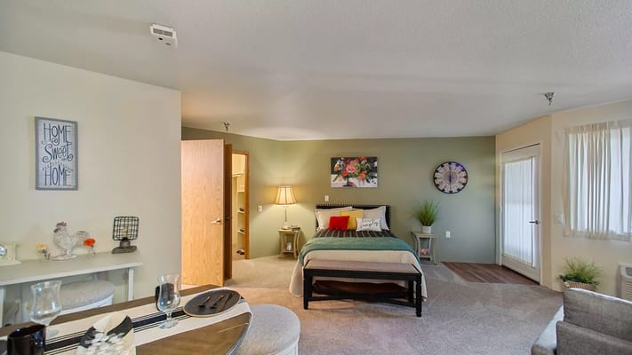 Cozy resident room with a bed and decorative elements