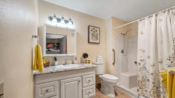 Well-decorated bathroom with floral accents