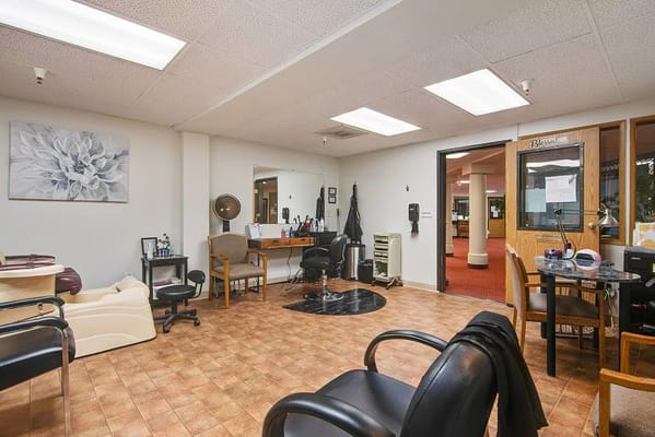 Salon interior with chairs and mirrors