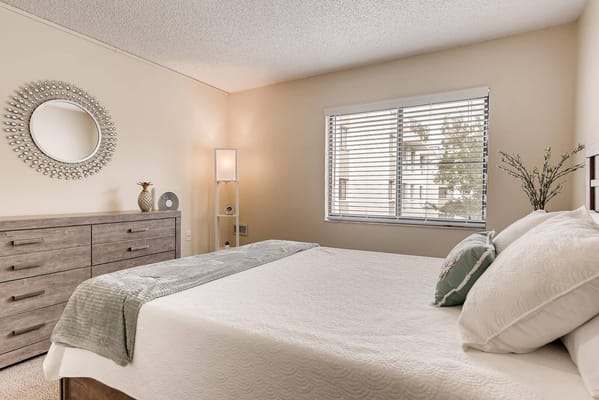 Cozy resident room with bed and modern decor