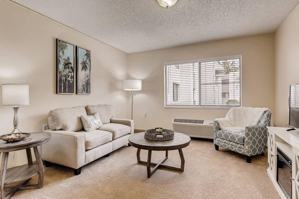 Cozy interior living area with sofa and artwork