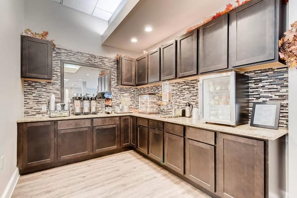 Interior kitchen area with cabinets and appliances