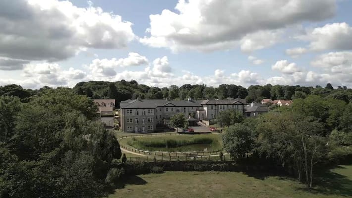 Aerial view of the Hollins Hall Retirement Village building and surroundings