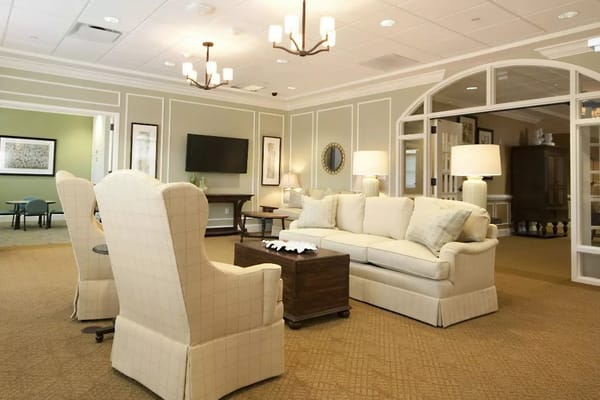 Bright common area with comfortable seating and decor