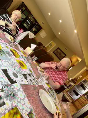Residents enjoying a meal together in a common area