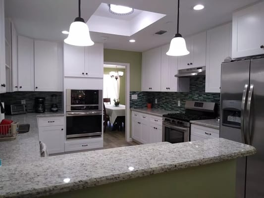 Bright kitchen area with modern appliances