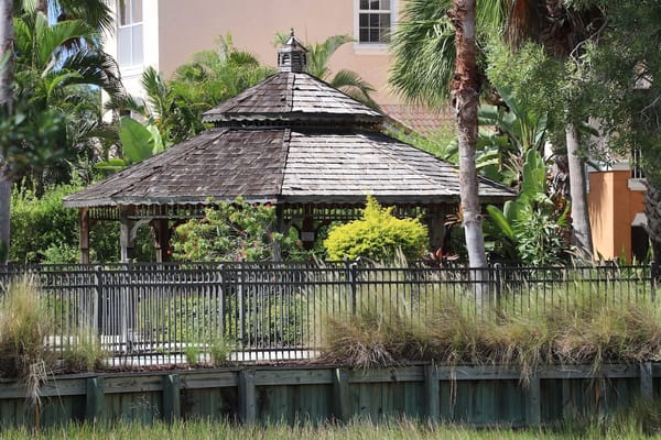 A gazebo in a landscaped outdoor area