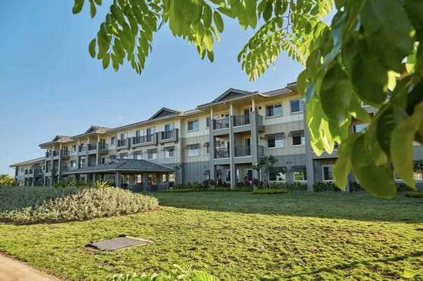 Front view of Ilima at Leihano with lush green surroundings.