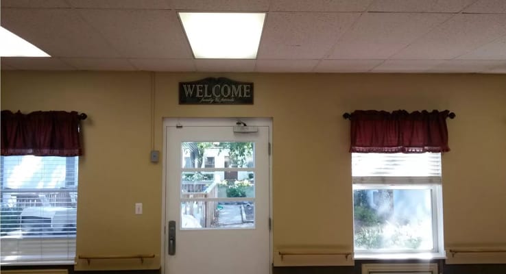 Welcoming sign in a facility lobby