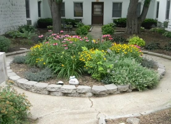 Vibrant garden with colorful flowers and pathways