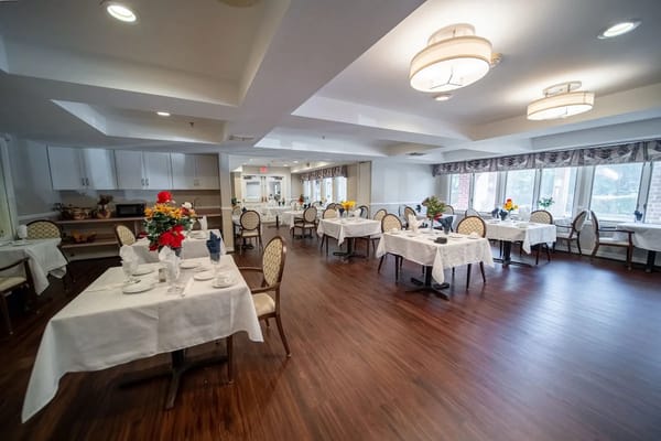 Dining area with tables set for meals
