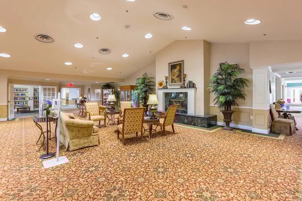 Lounge area with seating and decorative plants