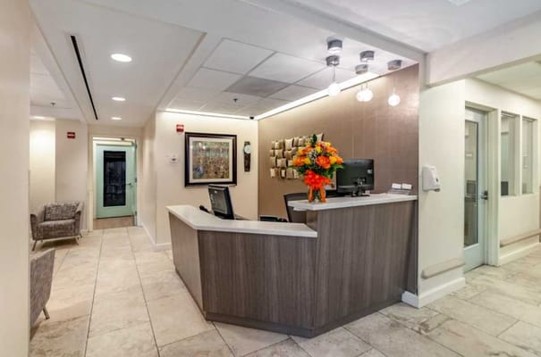 Bright reception area with floral arrangements