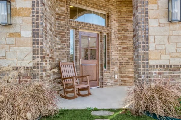 Entrance of the facility with a rocking chair