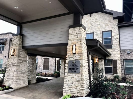 Entrance view of the Memory Care facility at Isle at Watercrest - Dominion