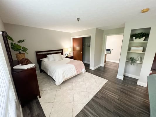 Cozy interior of a private resident room with a bed and furniture