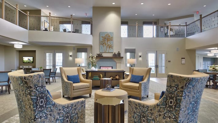 Bright common area with comfortable seating and decor