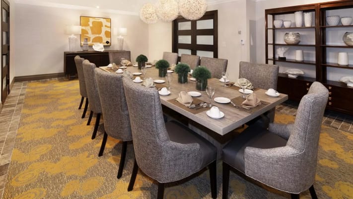 Elegant dining room setup with tables and chairs