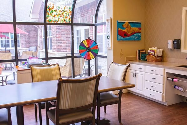 Bright common area with dining table and decor