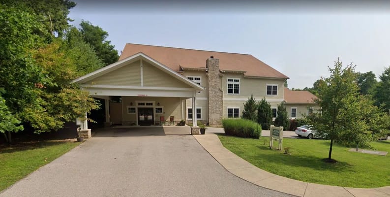 Exterior view of Jill's House Inc. with landscaped area