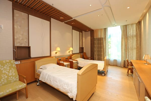 Bright and spacious resident room with two beds