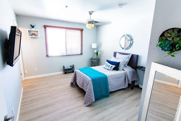 Well-decorated private resident room with window light