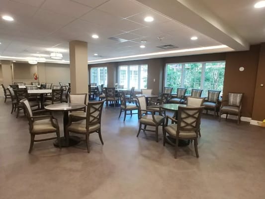Interior of a dining room with tables and chairs