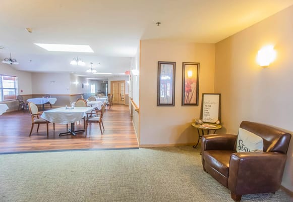 Cozy common area with seating and dining tables