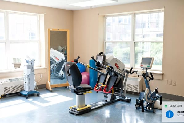 Interior gym equipment area with exercise machines