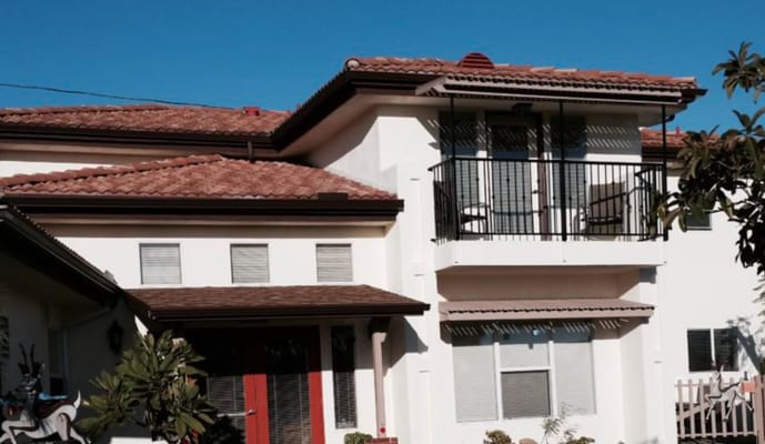Exterior of King's Care Assisted Living showing balcony and entrance