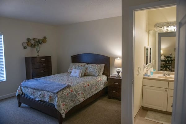 Well-furnished private bedroom with bathroom