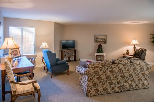 Cozy common area with seating and lamps