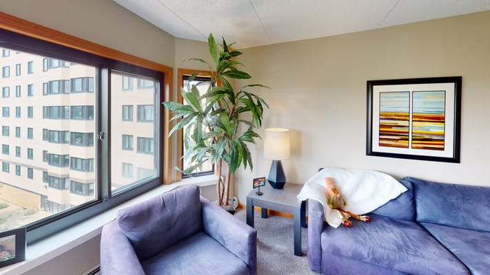 Cozy interior corner seating area with plants