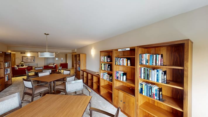 Bright interior of a library area with bookshelves