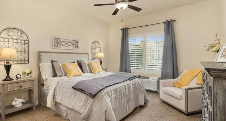 Inviting bedroom with a queen bed and soft lighting