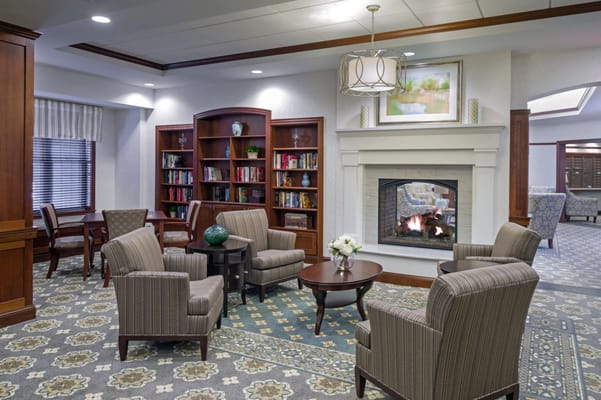 Cozy common area with seating and a fireplace