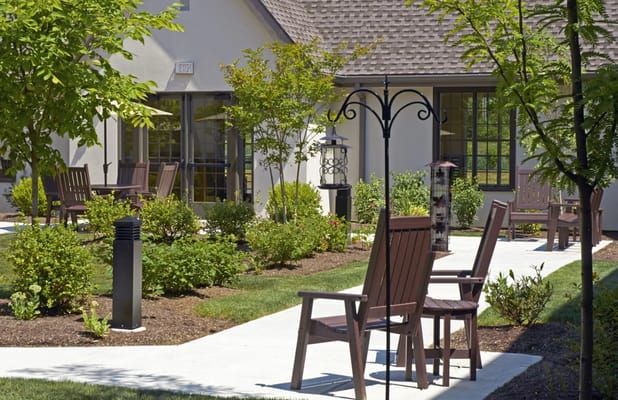 Outdoor seating area with gardens and walkways