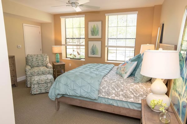 Well-decorated resident room with natural light