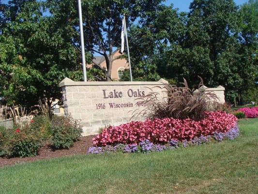 Facility sign with landscaping and flowers
