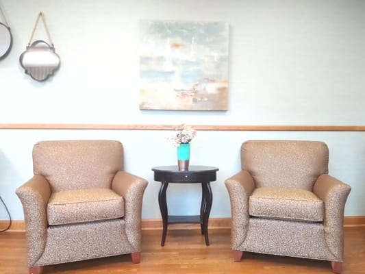 Cozy seating area with armchairs and a table