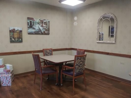 Cozy common area with a table and chairs