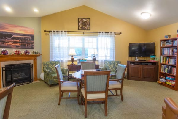 Common area with seating and a fireplace